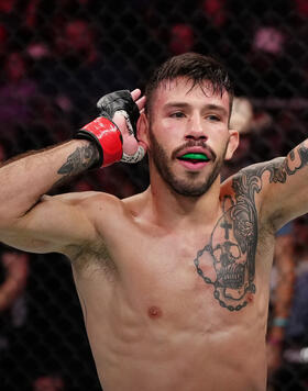 Matheus Nicolau of Brazil reacts after his TKO victory over Matt Schnell in a flyweight fight during the UFC Fight Night event at Amway Center on December 03, 2022 in Orlando, Florida. (Photo by Jeff Bottari/Zuffa LLC)