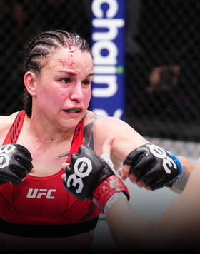 Raquel Pennington punches Ketlen Vieira of Brazil in a bantamweight fight during the UFC Fight Night event at UFC APEX on January 14, 2023 in Las Vegas, Nevada. (Photo by Chris Unger/Zuffa LLC)