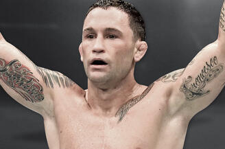 Frankie Edgar celebrates in The Octagon. 