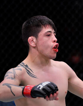 Brandon Moreno of Mexico celebrates his TKO victory over Brandon Royval in their flyweight bout during the UFC 255 event at UFC APEX on November 21, 2020 in Las Vegas, Nevada. (Photo by Jeff Bottari/Zuffa LLC)