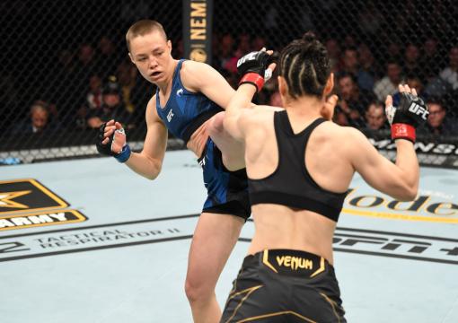 Rose Namajunas kicks Zhang Weili of China in their UFC women's strawweight championship bout during the UFC 261 event at VyStar Veterans Memorial Arena on April 24, 2021 in Jacksonville, Florida. (Photo by Josh Hedges/Zuffa LLC)