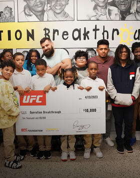 UFC athletes Julian Marquez and Jonathan Martinez spend time with middle school students as part of Operation Breakthrough in Kansas City, MO.