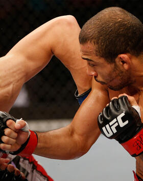 Jose Aldo punches "The Korean Zombie" Chan Sung Jung in their featherweight championship bout during UFC 163 at HSBC Arena on August 3, 2013 in Rio de Janeiro, Brazil. (Photo by Josh Hedges/Zuffa LLC)