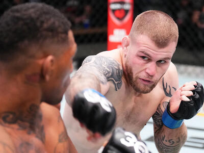 Jake Matthews of Australia punches Michael Morales of Ecuador in a welterweight fight during the UFC Fight Night event at UFC APEX on November 18, 2023 in Las Vegas, Nevada. (Photo by Chris Unger/Zuffa LLC)