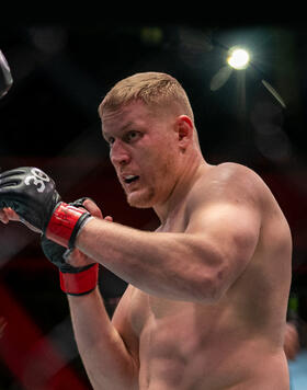 Sergei Pavlovich of Russia punches Curtis Blaydes in the UFC APEX on April 22, 2023. (Zuffa LLC)