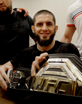 UFC Lightweight Champion Islam Makhachev gets a belt from his win at UFC 294.