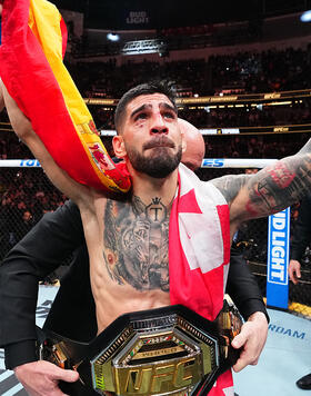 Ilia Topuria of Germany celebrates after his knockout victory against Alexander Volkanovski of Australia in the UFC featherweight championship fight during the UFC 298 event at Honda Center on February 17, 2024 in Anaheim, California. (Photo by Chris Unger/Zuffa LLC)