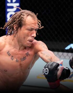 Marcus McGhee punches Journey Newson in a bantamweight fight during the UFC Fight Night event at UFC APEX on April 29, 2023 in Las Vegas, Nevada. (Photo by Jeff Bottari/Zuffa LLC)