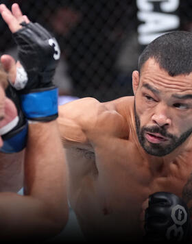 Dan Ige punches Nate Landwehr in their featherweight fight during the UFC 289 event at Rogers Arena on June 10, 2023 in Vancouver, Canada. (Photo by Jeff Bottari/Zuffa LLC)