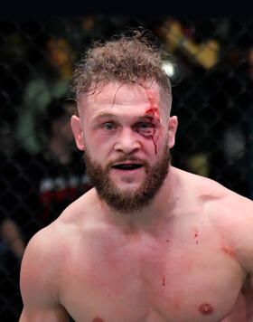 Rafael Fiziev of Kyrgyzstan reacts after his knockout victory over Brad Riddell of New Zealand in their lightweight fight during the UFC Fight Night event at UFC APEX on December 04, 2021 in Las Vegas, Nevada. (Photo by Jeff Bottari/Zuffa LLC)