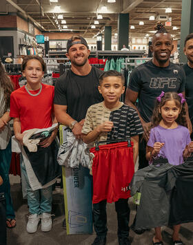 UFC flyweights Ode Osbourne and Alex Perez, were joined by strawweight Tatiana Suarez, bantamweight Cody Stamann at Dick’s Sporting Good’s Back to School Shop with a Cop event.