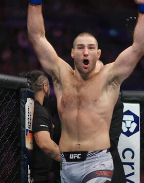 Sean Strickland of United States celebrates victory over Israel Adesanya of Nigeria to become the new middleweight champion of the world during the UFC 293 event at Qudos Bank Arena on September 10, 2023 in Sydney, Australia. (Photo by Mark Evans/Getty Images)