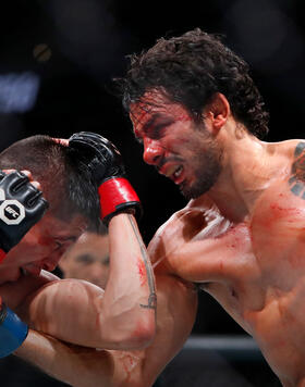 Alexandre Pantoja (R) battles with UFC flyweight champion Brandon Moreno during UFC 290 at T-Mobile Arena on July 08, 2023 in Las Vegas, Nevada. Pantoja won the title by split decision. (Photo by Steve Marcus/Getty Images)