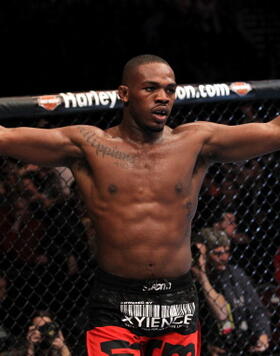 New UFC Light Heavyweight Champion Jon Jones celebrates after defeating Mauricio "Shogun" Rua at UFC 128 at the Prudential Center on March 19, 2011 in Newark, New Jersey. (Photo by Al Bello/Zuffa LLC)