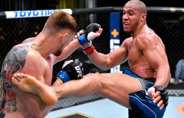 Ciryl Gane of France kicks Alexander Volkov of Russia in a heavyweight fight during the UFC Fight Night event at UFC APEX on June 26, 2021 in Las Vegas, Nevada. (Photo by Chris Unger/Zuffa LLC)