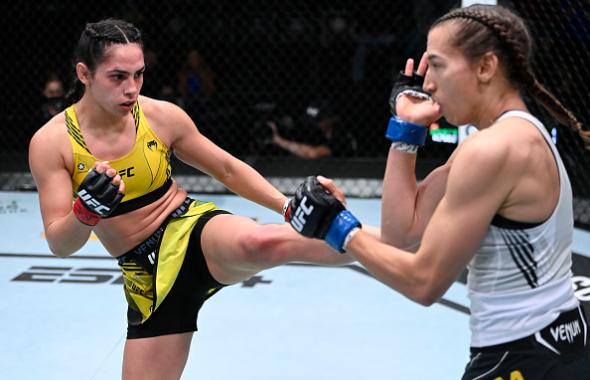 Ariane Lipski of Brazil kicks Mandy Bohm of Germany in a flyweight fight during the UFC Fight Night event at UFC APEX on September 18, 2021 in Las Vegas, Nevada. (Photo by Jeff Bottari/Zuffa LLC)