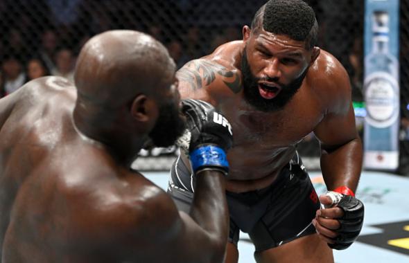 Curtis Blaydes punches Jairzinho Rozenstruik of Suriname in their heavyweight fight during the UFC 266 event on September 25, 2021 in Las Vegas, Nevada. (Photo by Jeff Bottari/Zuffa LLC)