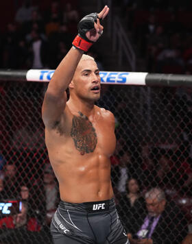 Carlos Ulberg of New Zealand reacts after defeating Fabio Cherant in their light heavyweight fight during the UFC 271 event at Toyota Center on February 12, 2022 in Houston, Texas. (Photo by Josh Hedges/Zuffa LLC)