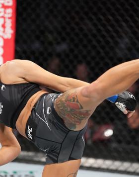 Casey O'Neill of United Kingdom kicks Roxanne Modafferi in their flyweight fight during the UFC 271 event at Toyota Center on February 12, 2022 in Houston, Texas. (Photo by Josh Hedges/Zuffa LLC)