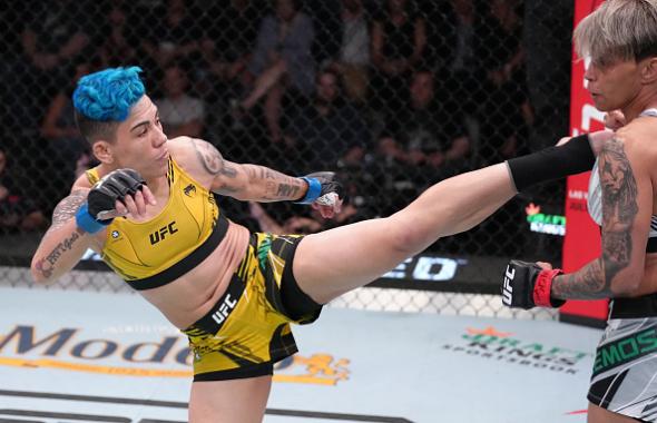 Jessica Andrade of Brazil kicks Amanda Lemos of Brazil in a strawweight fight during the UFC Fight Night event at UFC APEX on April 23, 2022 in Las Vegas, Nevada. (Photo by Jeff Bottari/Zuffa LLC)