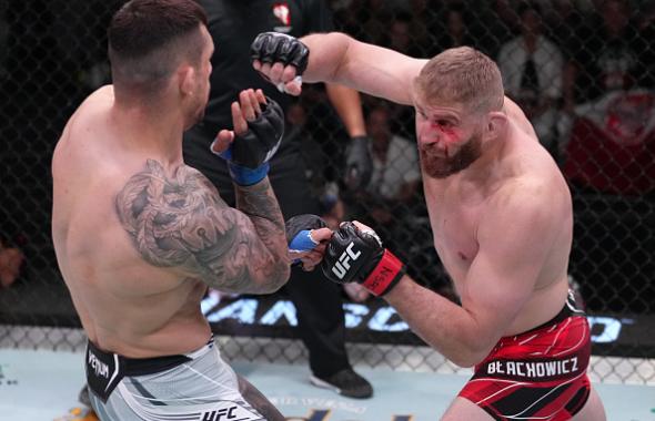 Jan Blachowicz of Poland punches Aleksandar Rakic of Austria in a light heavyweight fight during the UFC Fight Night event at UFC APEX on May 14, 2022 in Las Vegas, Nevada. (Photo by Jeff Bottari/Zuffa LLC)