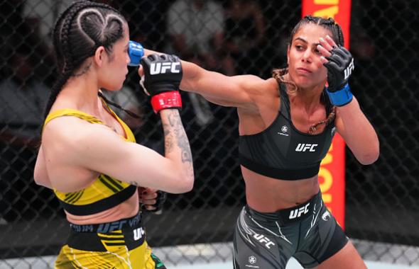 Tabatha Ricci of Brazil punches Polyana Viana of Brazil in a strawweight bout during the UFC Fight Night event at UFC APEX on May 21, 2022 in Las Vegas, Nevada. (Photo by Chris Unger/Zuffa LLC)