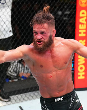 Rafael Fiziev of Kazakstan celebrates after his knockout victory over Rafael Dos Anjos of Brazil in their lightweight fight during the UFC Fight Night event at UFC APEX on July 09, 2022 in Las Vegas, Nevada. (Photo by Chris Unger/Zuffa LLC)