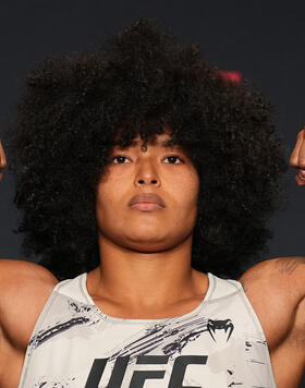 Karine Silva of Brazil poses on the scale during the UFC Fight Night weigh-in at Santa Fe Station Hotel & Casino on April 21, 2023 in Las Vegas, Nevada. (Photo by Chris Unger/Zuffa LLC via Getty Images)