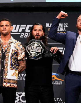 Dustin Poirier and Justin Gaethje pose as inaugural BMF champ Jorge Masvidal holds the belt during the UFC 291 press conference at Salt Palace Convention Center on July 27, 2023 in Salt Lake City, Utah. (Photo by Jeff Bottari/Zuffa LLC)