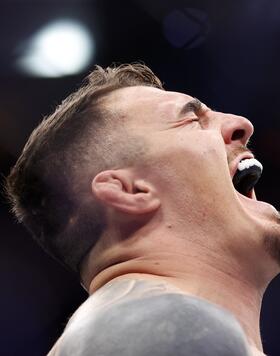 Tom Aspinall of England reacts after his knockout victory against Sergei Pavlovich of Russia in the interim UFC heavyweight championship fight during the UFC 295 event at Madison Square Garden on November 11, 2023 in New York City. (Photo by Sarah Stier/Getty Images)