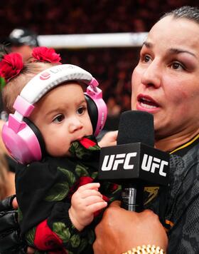 Raquel Pennington reacts after her victory against Mayra Bueno Silva of Brazil in a UFC bantamweight championship bout during the UFC 297 event at Scotiabank Arena on January 20, 2024 in Toronto, Ontario. (Photo by Jeff Bottari/Zuffa LLC via Getty Images)