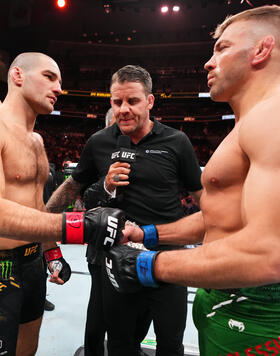 Opponents Sean Strickland and Dricus Du Plessis of South Africa face off prior to their UFC middleweight championship bout during the UFC 297 event at Scotiabank Arena on January 20, 2024 in Toronto, Ontario. (Photo by Jeff Bottari/Zuffa LLC)