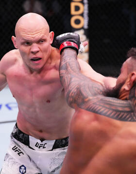 Bogdan Guskov of Uzbekistan punches Zac Pauga in a light heavyweight fight during the UFC Fight Night event at UFC APEX on February 10, 2024 in Las Vegas, Nevada. (Photo by Jeff Bottari/Zuffa LLC)