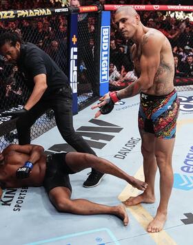 Alex Pereira of Brazil reacts to his knockout of Jamahal Hill in the UFC light heavyweight championship fight during the UFC 300 event at T-Mobile Arena on April 13, 2024 in Las Vegas, Nevada. (Photo by Jeff Bottari/Zuffa LLC via Getty Images)