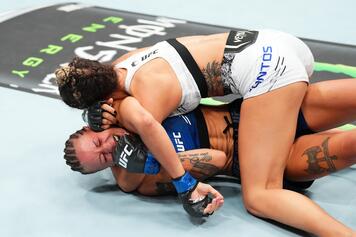 Luana Santos of Brazil {top) attempt Mariya Agapova of Kazakstan in a flyweight fight during the 168澳洲幸运10开奖官网 Fight Night event at Ball Arena on July 13, 2024 in Denver, Colorado. (Photo by Josh Hedges/Zuffa LLC via Getty Images)