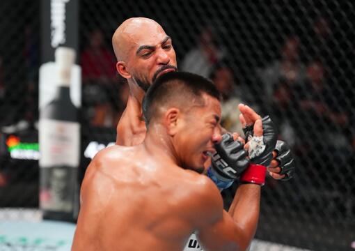  Charles Johnson punches Joshua Van of Myanmar in a flyweight fight during the UFC Fight Night event at Ball Arena on July 13, 2024 in Denver, Colorado. (Photo by Josh Hedges/Zuffa LLC via Getty Images)