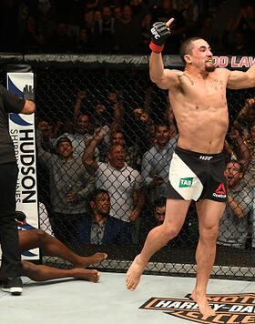 Robert Whittaker of New Zealand celebrates his TKO victory over Derek Brunson in their middleweight bout during the UFC Fight Night event at Rod Laver Arena on November 27, 2016 in Melbourne, Australia. (Photo by Jeff Bottari/Zuffa LLC)