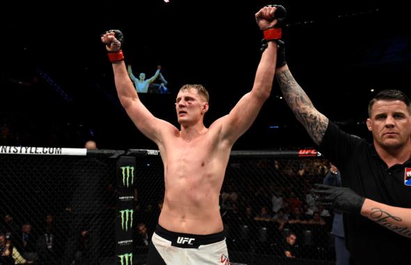 ROTTERDAM, NETHERLANDS - SEPTEMBER 02:  Alexander Volkov of Russia celebrates after defeating Stefan Struve of The Netherlands by TKO in their heavyweight bout during the UFC Fight Night event at the Rotterdam Ahoy on September 2, 2017 in Rotterdam, Nethe