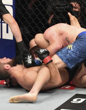 Khabib Nurmagomedov of Russia submits Justin Gaethje in their lightweight title bout during the UFC 254 event on October 25, 2020 on UFC Fight Island, Abu Dhabi, United Arab Emirates. (Photo by Josh Hedges/Zuffa LLC)