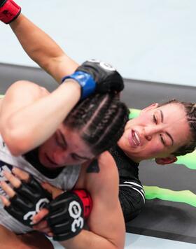 Miesha Tate def. Julia Avila by submission (rear-naked choke) at 1:15 of Round 3 (Photo by Josh Hedges/Zuffa LLC)